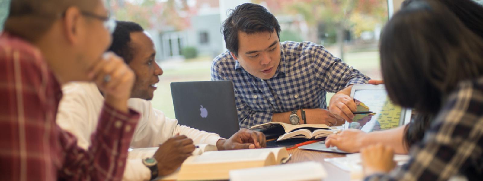 Graduate students studying