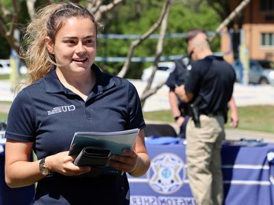 Freshman Business major Ane Peasley meets potential employers at the career fair. (Photo by Chariti Mealing, CIU Student Photographer) 